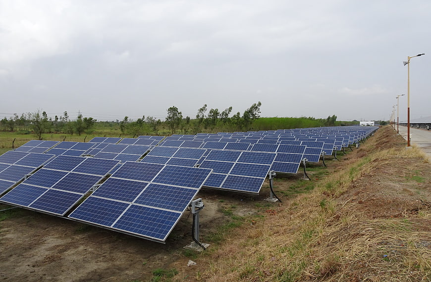 Large Solar Panel Array On Canal Bank In Rural India