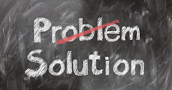 Problem crossed out and Solution written on chalkboard