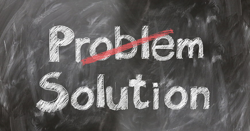 Problem crossed out and Solution written on chalkboard