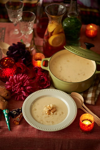 Creamy Soup in Green Pot and Bowl with Croutons