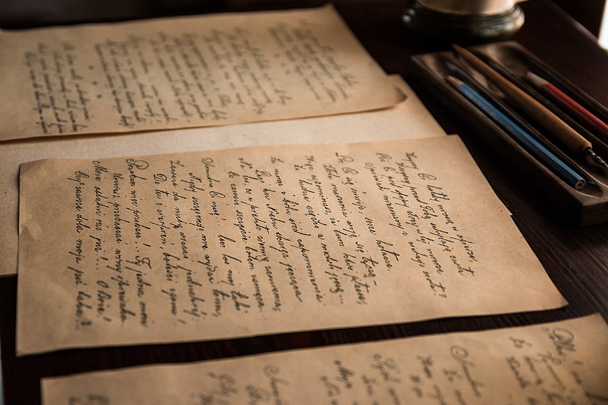 Vintage handwritten letters on aged paper with fountain pens