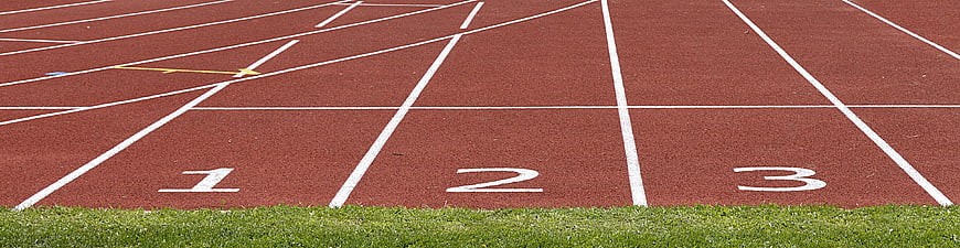 Red Tartan Running Track with White Lane Numbers