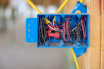 Close-up of Blue Electrical Junction Box with Wires