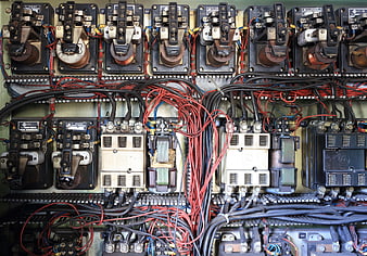 Close-up of industrial electrical control panel with wiring