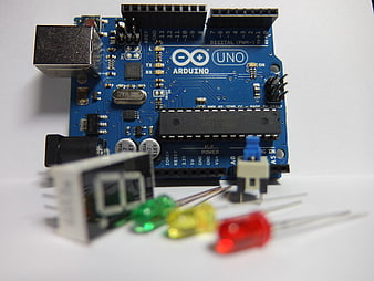 Arduino Uno Microcontroller Board With Electronic Components