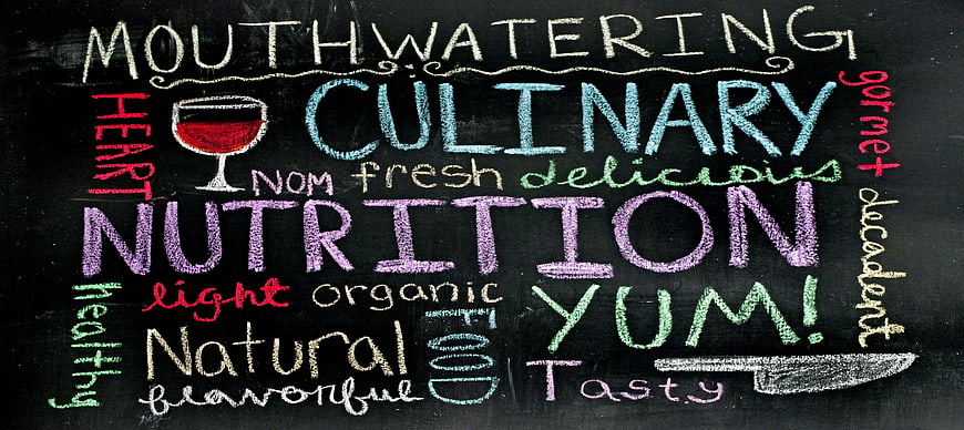 Colorful culinary nutrition word cloud on blackboard