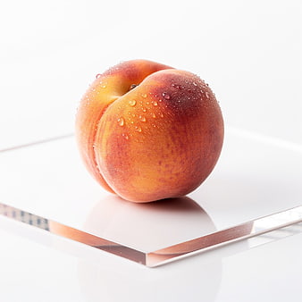 Fresh Ripe Peach with Water Droplets on White Background