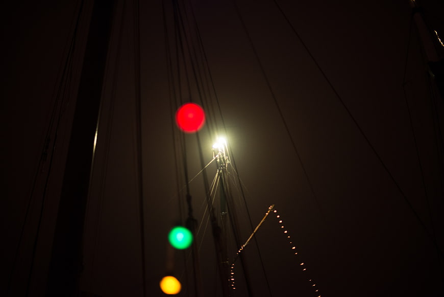 Bokeh Traffic Lights and Street Lamp at Night