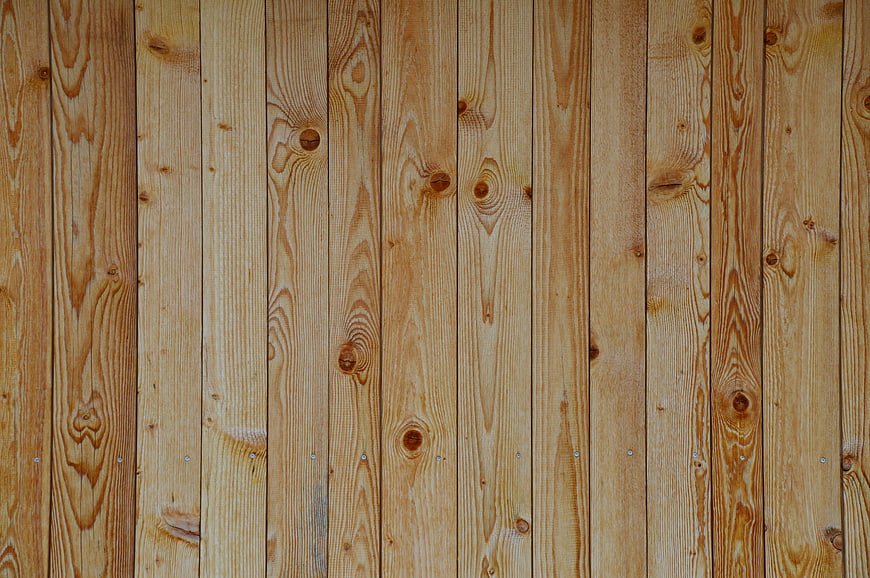Vertical Wooden Plank Wall Texture With Natural Grain And Knots