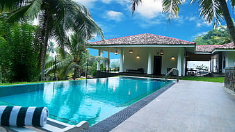 Tropical Villa with Swimming Pool and Palm Trees