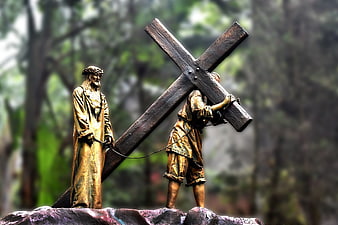 Bronze Statue of Jesus Carrying the Cross in Forest