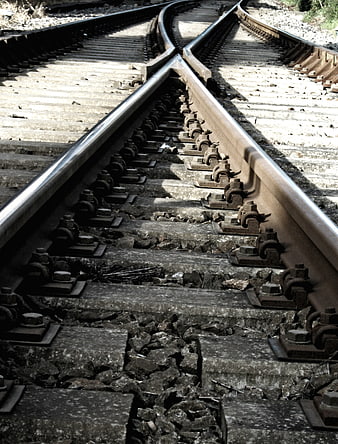 Railroad Track Switch Junction With Weathered Steel Rails And Concrete Sleepers