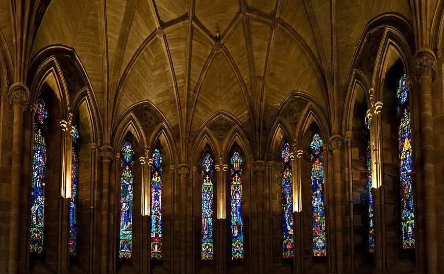 Gothic Cathedral Interior with Stained Glass Windows