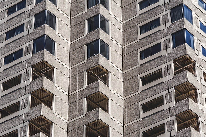 Modern Apartment Building Facade with Geometric Balcony Pattern