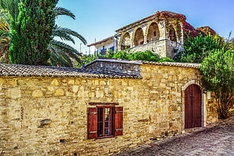 Traditional Stone House with Arched Balcony in Cyprus