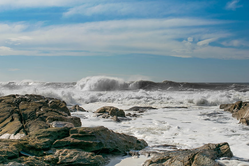 Powerful Ocean Waves Crashing on Rocky Coastline