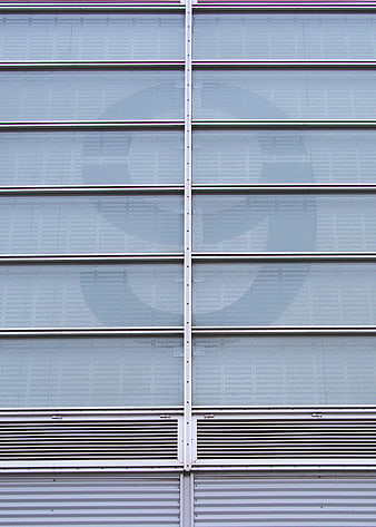 Modern building facade with large number nine graphic