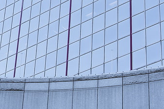 Modern Glass Building Facade with Purple Accents