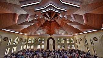 Interior of Somuncubaba Mosque with Geometric Wooden Ceiling and Congregation