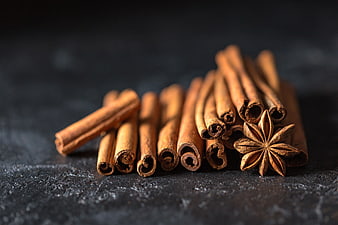 Cinnamon Sticks and Star Anise on Dark Background