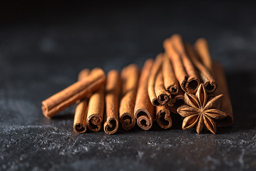 Cinnamon Sticks and Star Anise on Dark Background