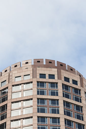 Low Angle View of Curved Modern Office Building Facade