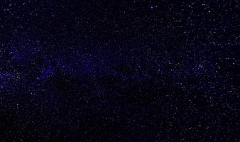 Deep blue starry night sky with Milky Way galaxy