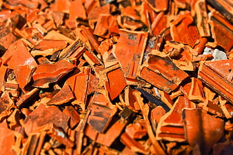 Broken Red Roof Tiles And Terracotta Fragments Close Up