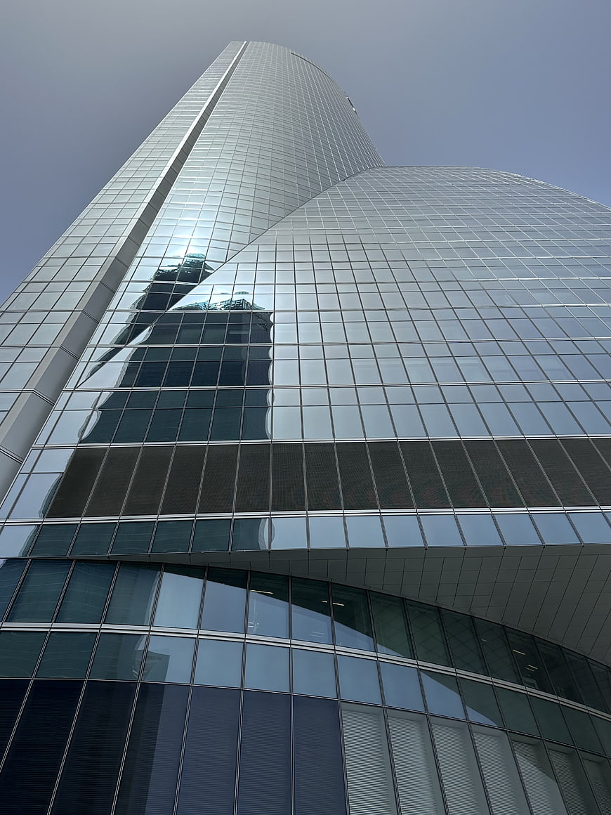 Low angle view of modern glass skyscraper architecture