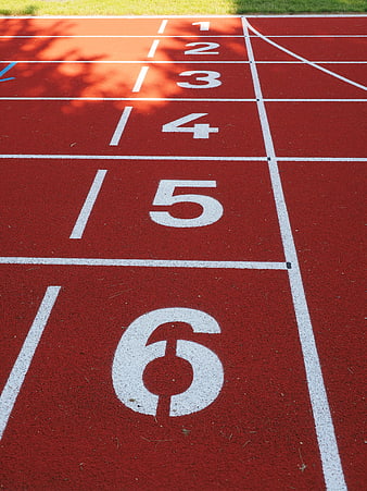 Red Tartan Running Track With White Lane Numbers 1 To 6