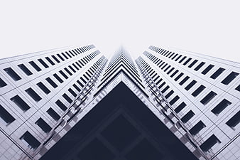 Symmetrical Low Angle View of Modern Skyscraper Architecture