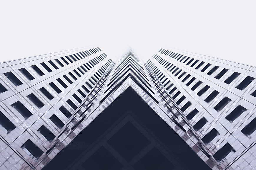 Symmetrical Low Angle View of Modern Skyscraper Architecture