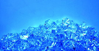 Pile of Blue Crystal Diamonds on Blue Background
