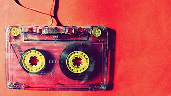 Vintage cassette tape on red background