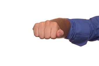 Clenched fist of a man in a blue shirt on white background