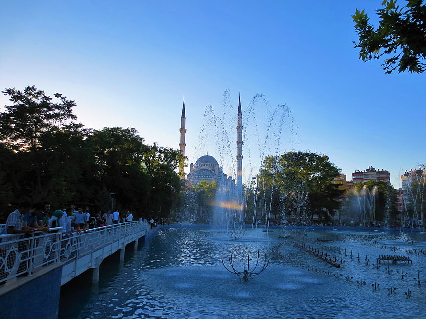 Mosque with Minarets and Fountain in City Park