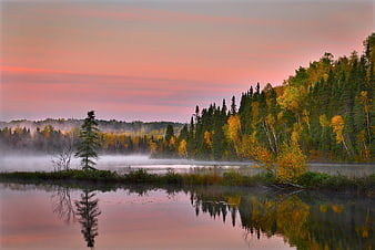 Misty Autumn Lake Landscape with Vibrant Foliage and Reflections