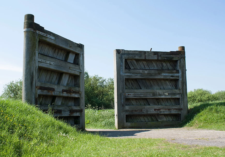 Old Weathered Wooden Gate in Green Field