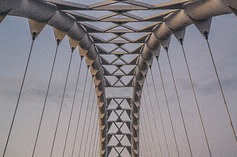 Low angle view of modern suspension bridge steel structure