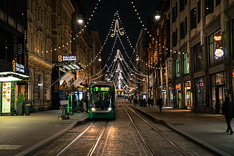 Helsinki tram on Esplanadi street with Christmas lights