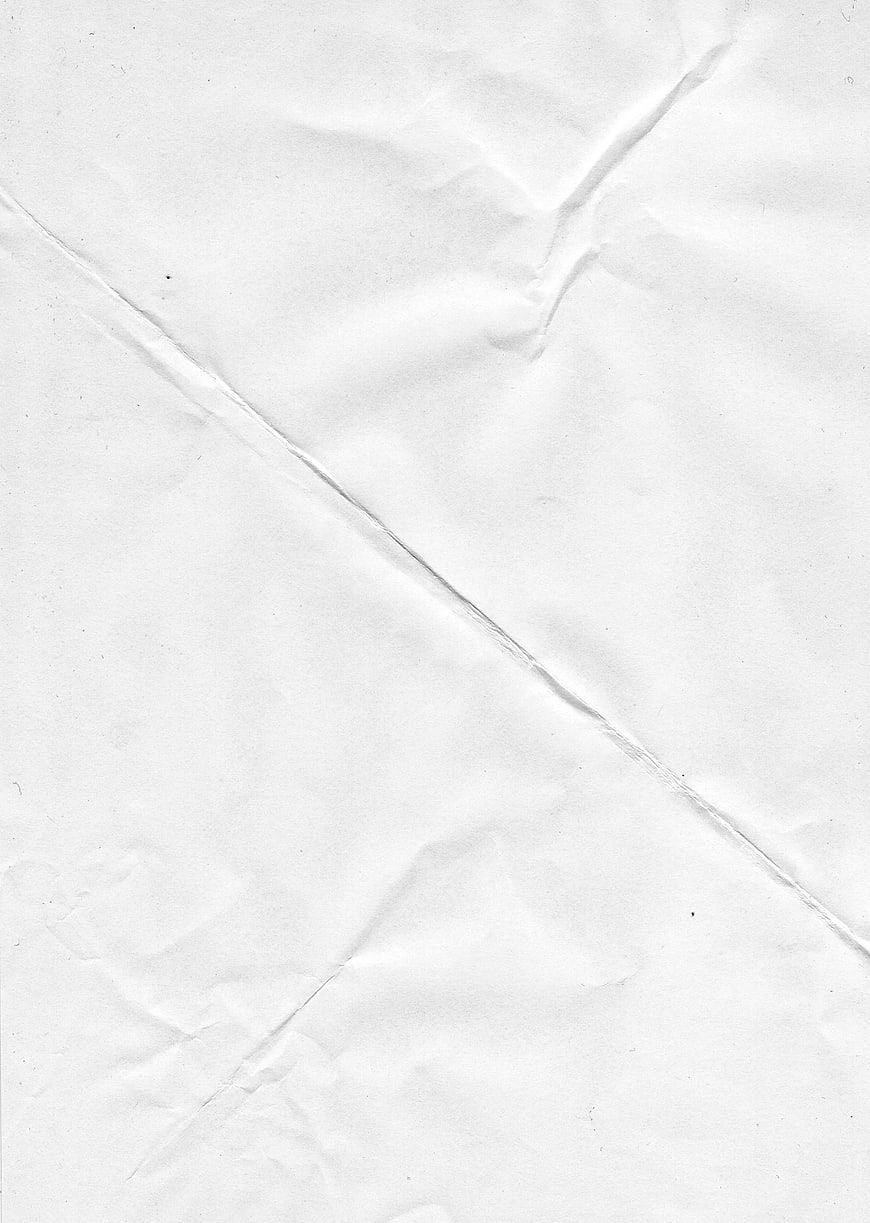 Crumpled White Paper Texture Background
