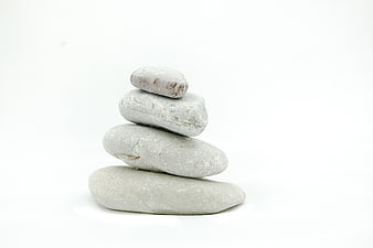 Stacked Zen Stones on White Background