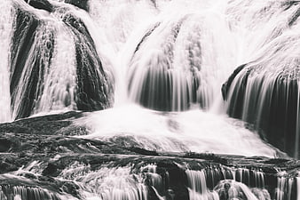 Black and White Long Exposure Waterfall Flowing Over Rocks