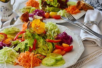 Colorful Fresh Vegetable Salad Platter with Cutlery