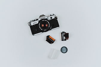 Vintage Canon AE-1 Film Camera Flat Lay with Accessories