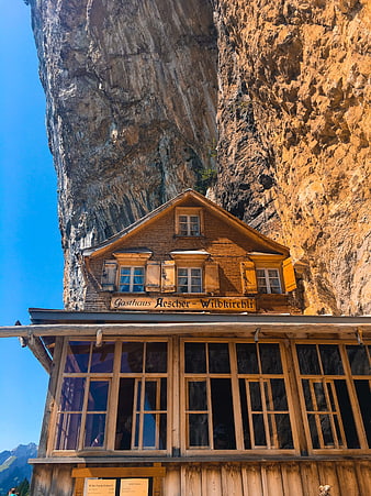 Traditional Swiss Gasthaus Aescher Built into Cliff Face