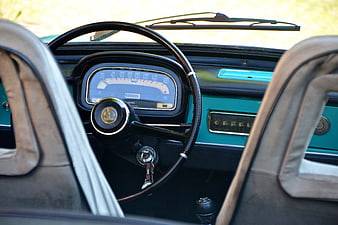 Vintage Car Interior with Retro Steering Wheel and Dashboard