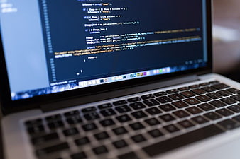Close-up of PHP code on laptop screen