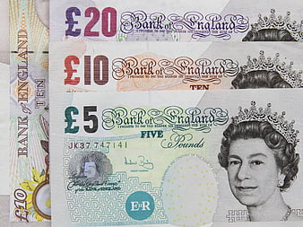 Stack of British Pound Banknotes Featuring Queen Elizabeth II