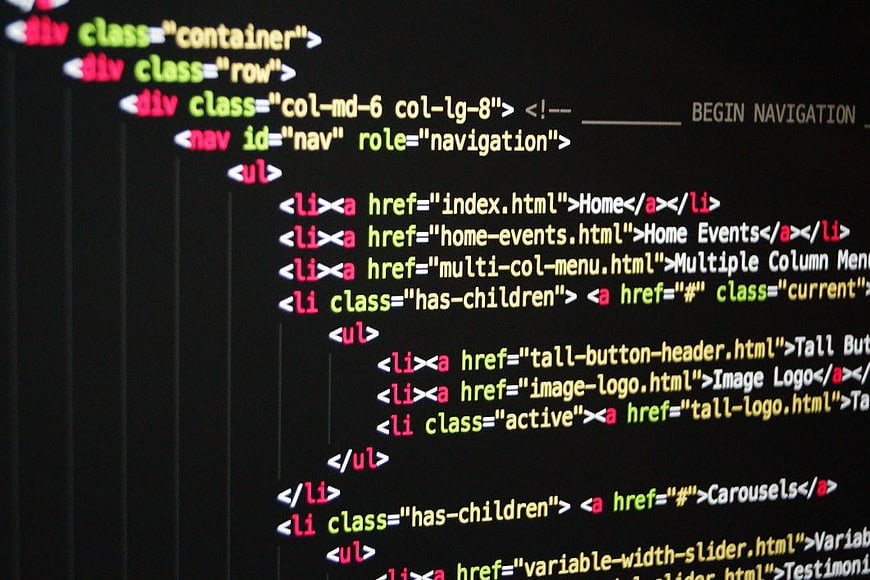 HTML Code Snippet on Dark Screen